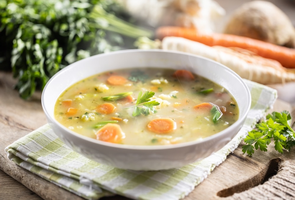 Spring Vegetable Soup With Chopped And Grated Root Vegetables Seasoned