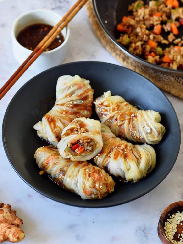 A top view of vegan cabbage rolls dished out