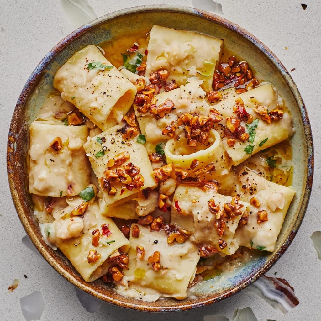 Top view of a creamy white sauce vegetarian pasta