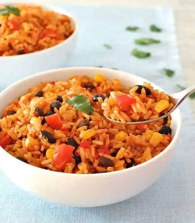 pot of mexican rice with addition of black bean