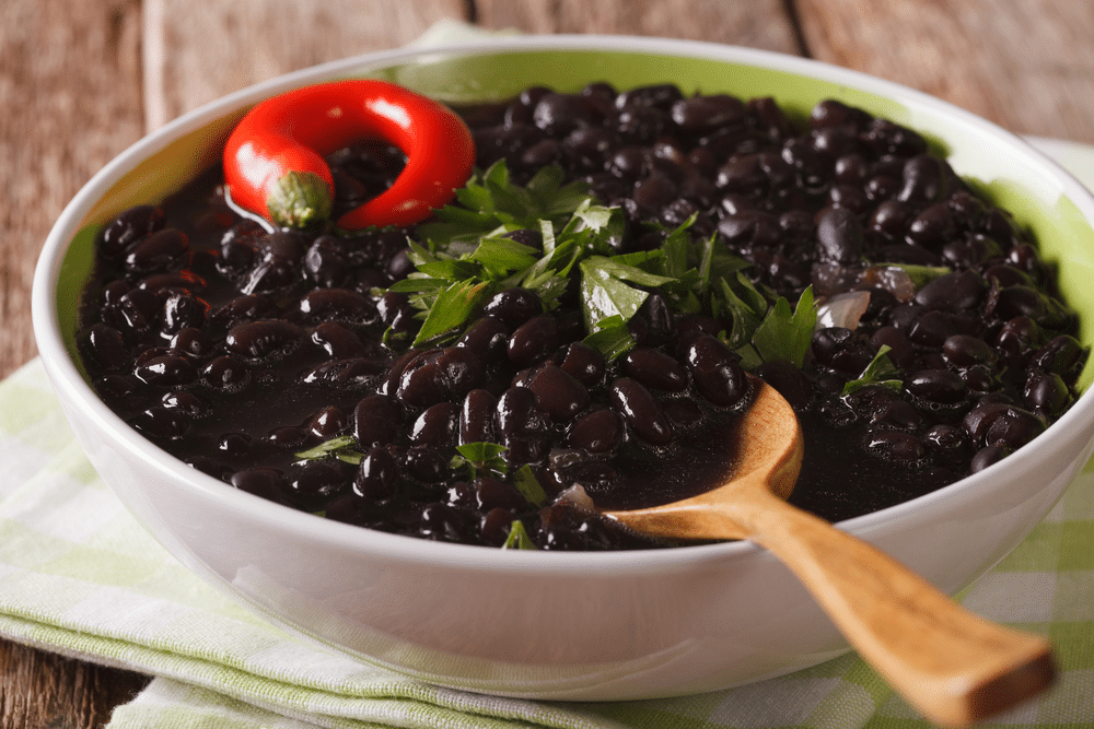 A bowl of a black bean soup