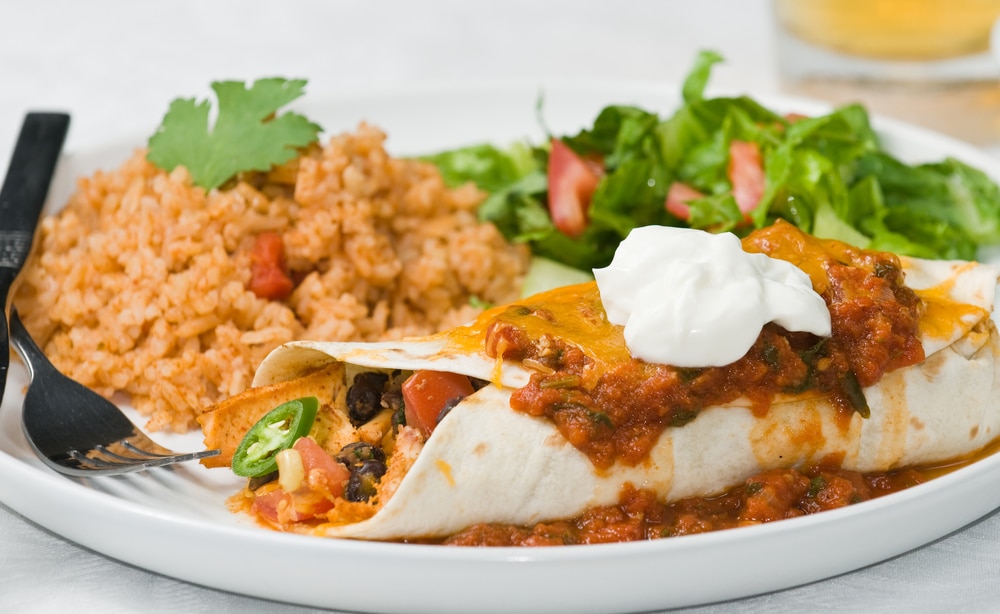 A view of a wrapped black bean burrito