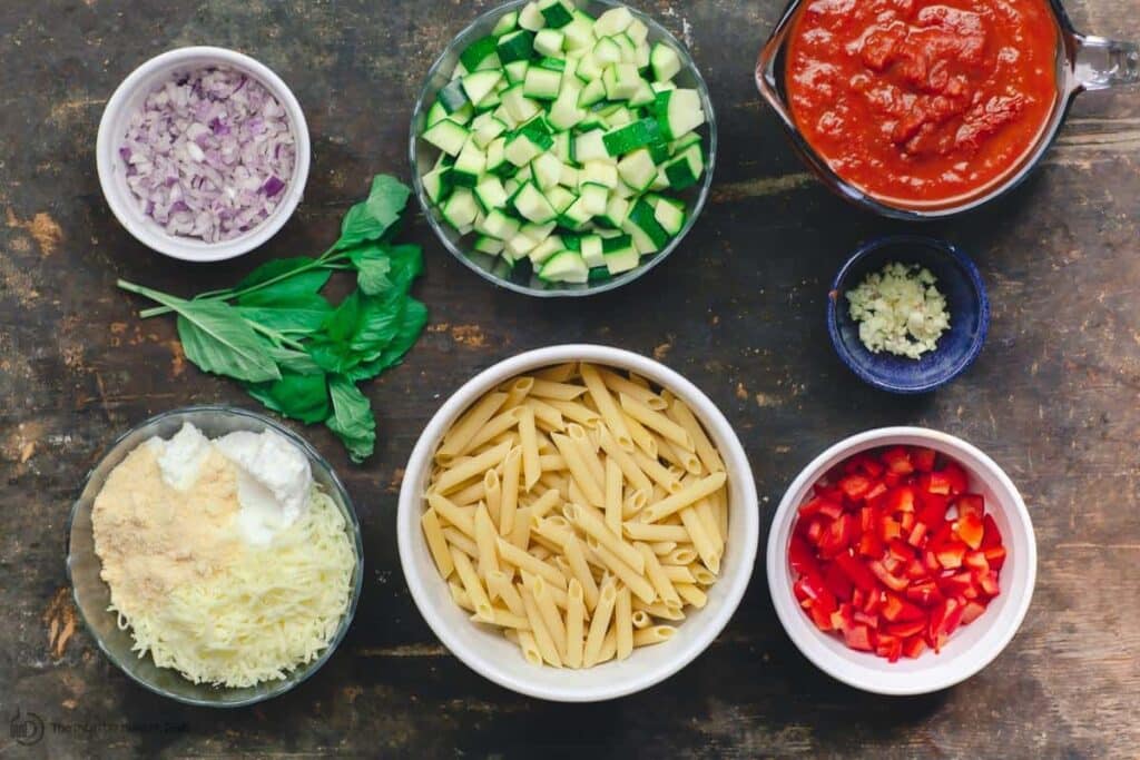 A top view of the ingredients for a baked ziti recipe vegetarian