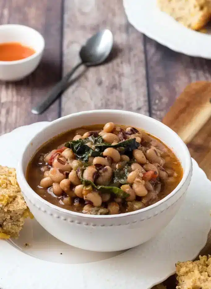 A view of black eyed peas served in a white bowl