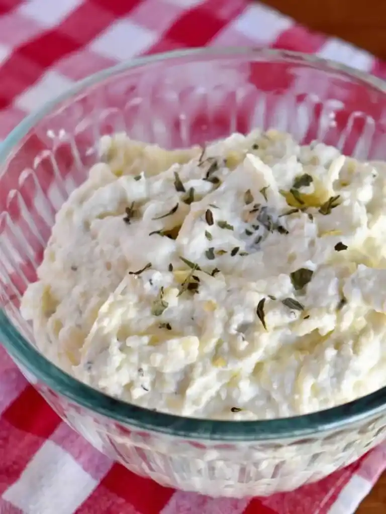 A view of ricotta cheese filling inside a bowl