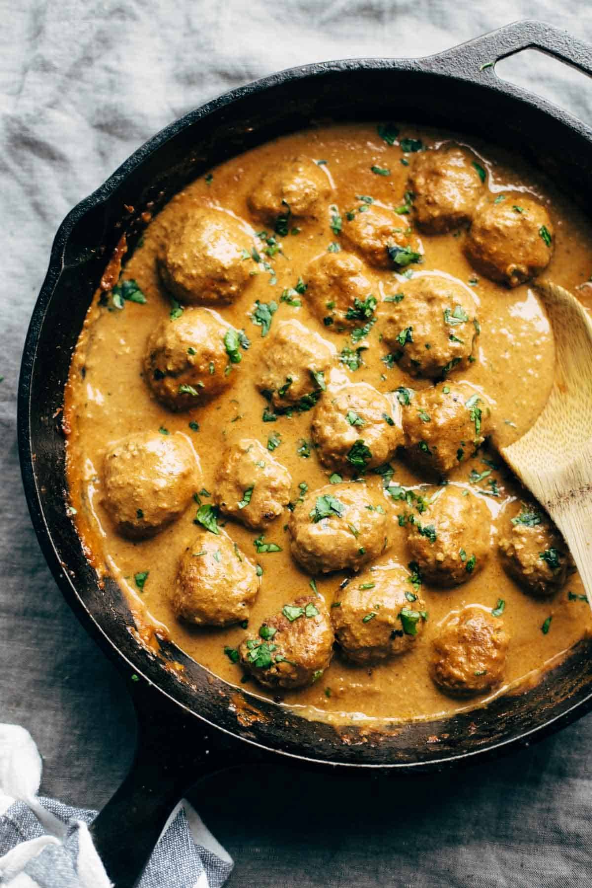 A top view of vegan meatballs in gravy