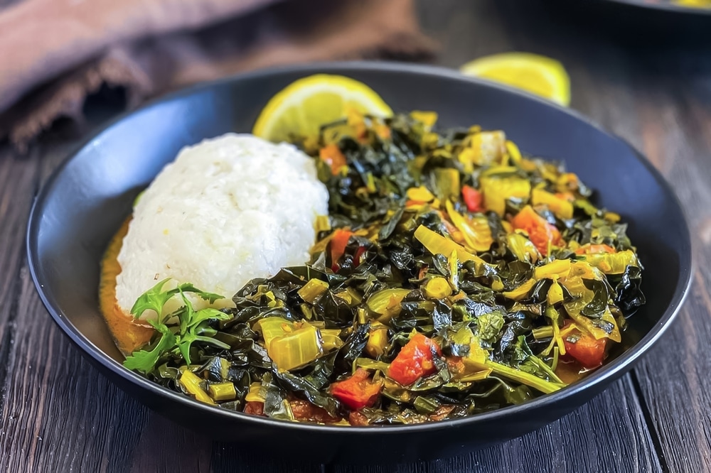 A view of collard greens dished out in a plate