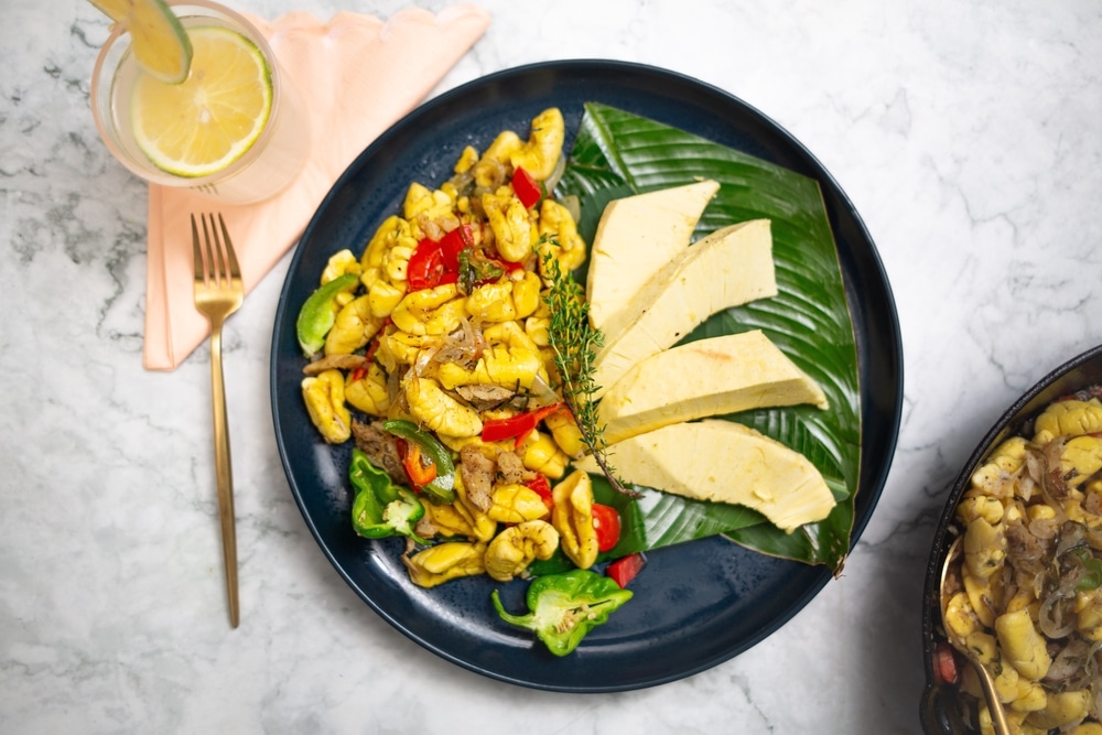 An overhead view of saltfish and ackee Jamaican meal dished out