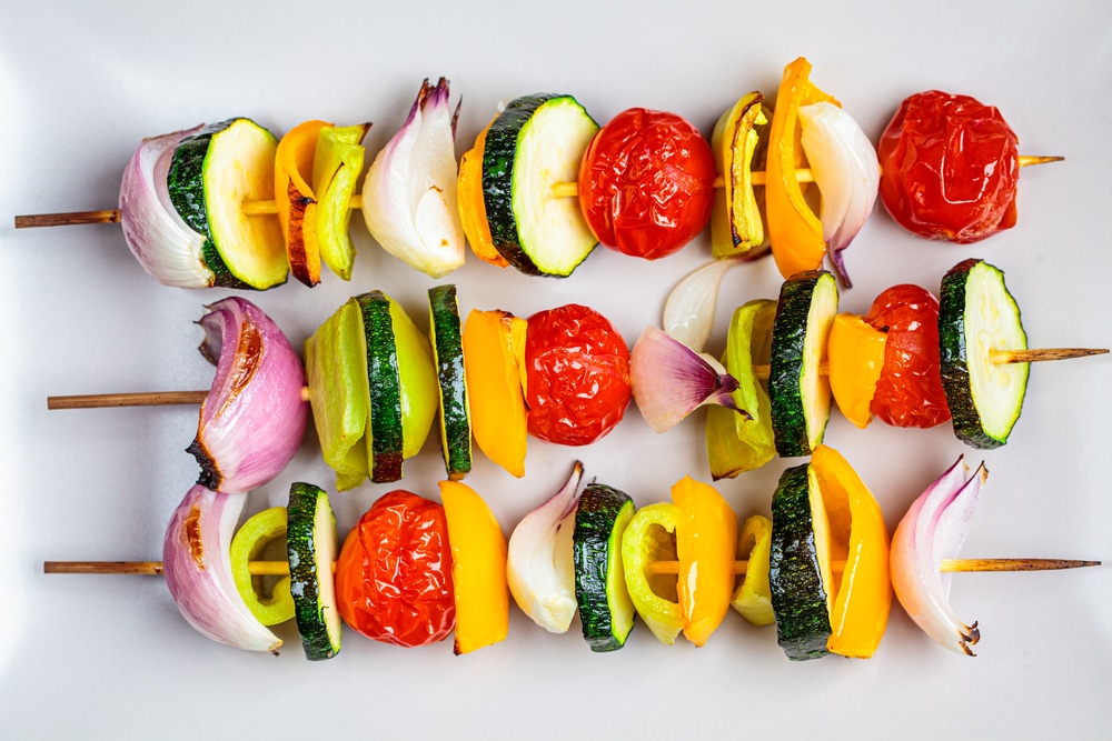 A top view of vegetable skewers