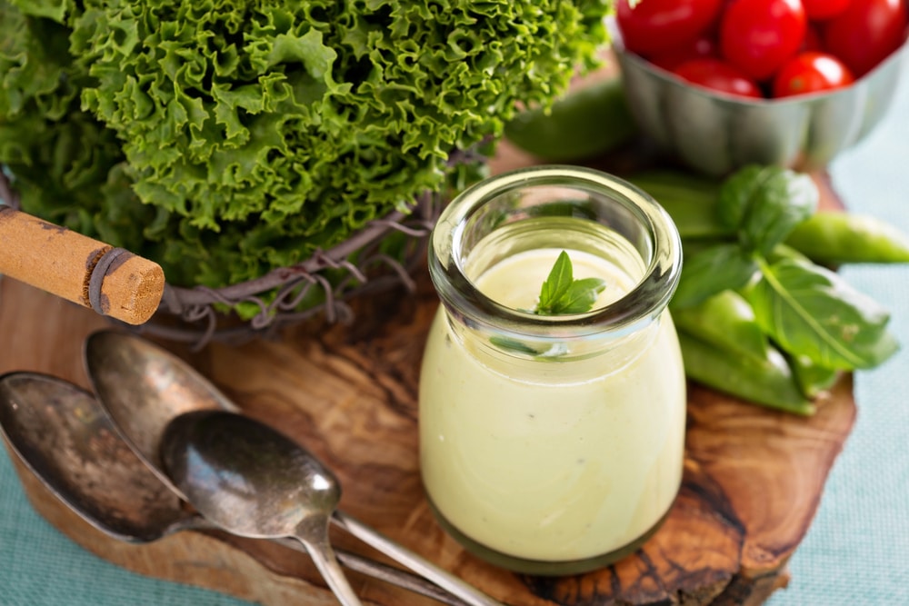 A view of vegan salad dressing in a glass bottle