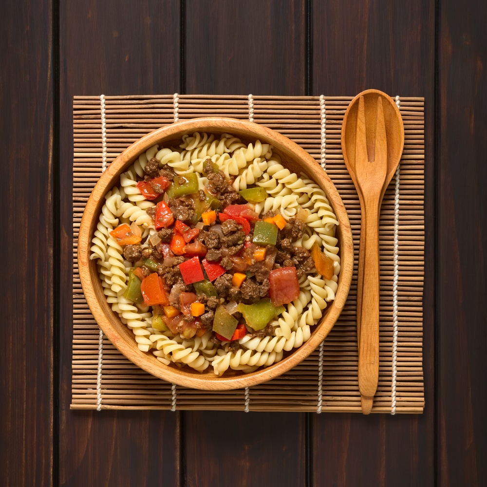 An overhead view of a vegan pasta with veggie sauce