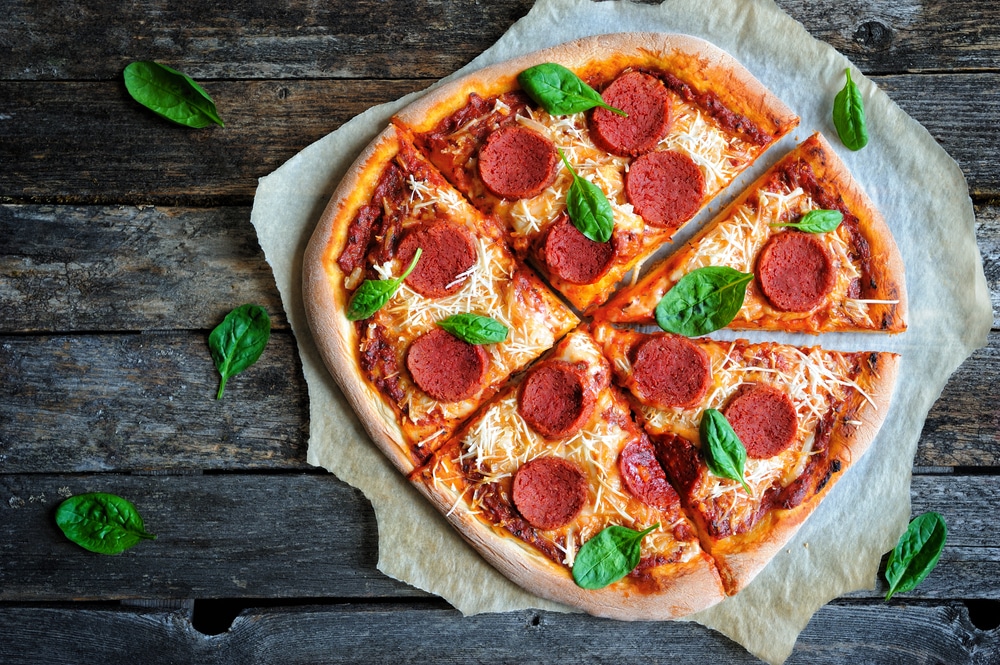 A top view of a vegan pepperoni pizza