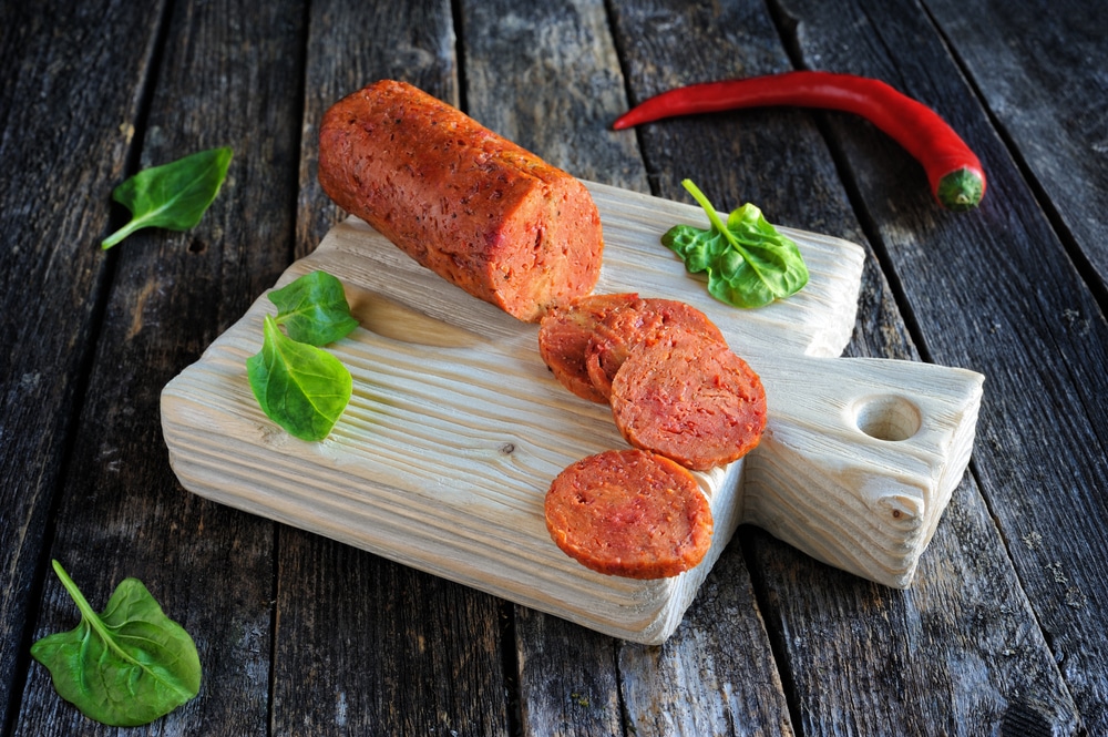 A view of a cut veegtarian pepperoni