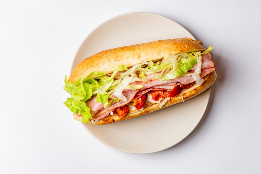 An overhead view of a veggie sandwich